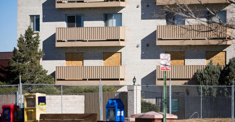 boarded apartment windows