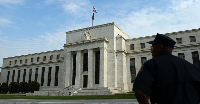 Fed Leaves Rates Unchanged, Signals Openness to June Increase
