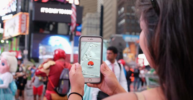 Pokemon Go on phone in Times Square