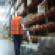 warehouse worker pulling forklift-ts-685855708.jpg